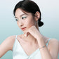 FIYTA Little Luck Four-Leaf Clover Bracelet AB0015.WSDG worn on the wrist (Aqua Blue)