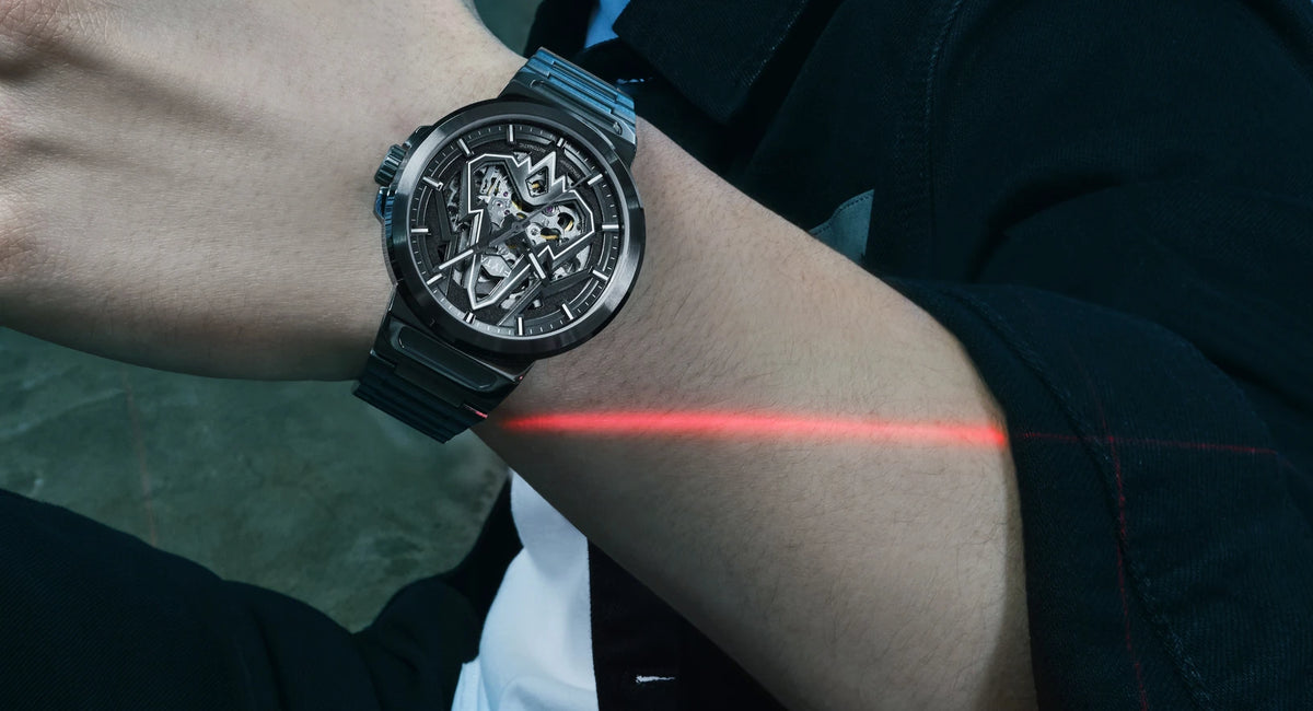 FIYTA Space Rocket DGA35011.HHH gunmetal watch and steel bracelet worn on the wrist