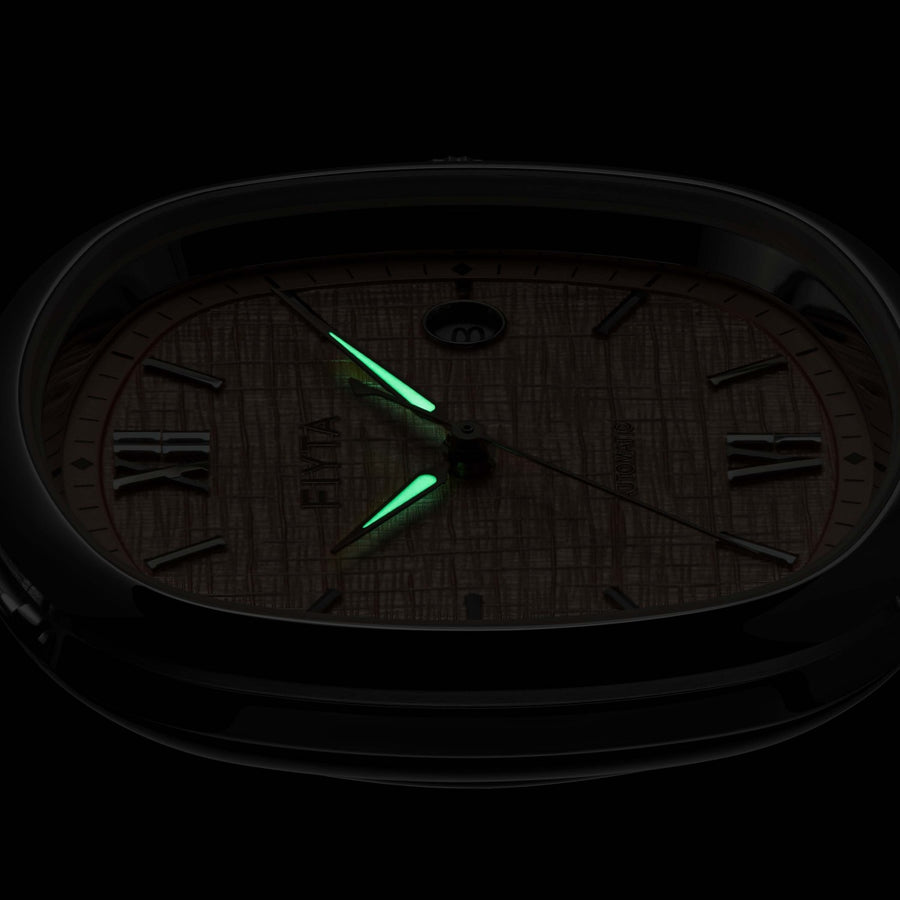 The hands on the FIYTA Tempered rose-dial watch glowing green against a dark background. (GA850028.WOK)