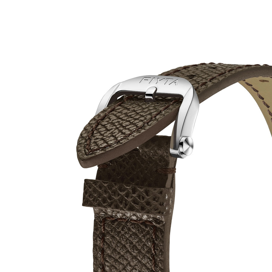 Close-up of the FIYTA Tempered brown textured strap and silver-tone pin buckle. (GA850028.WOK)