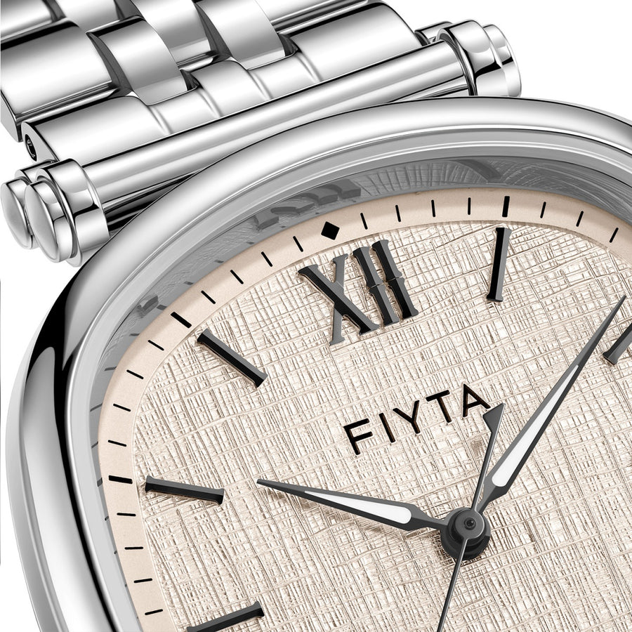 Close-up of the FIYTA Tempered light textured dial with Roman numerals, raised hour markers and silver-tone case. (GA850028.WWW)